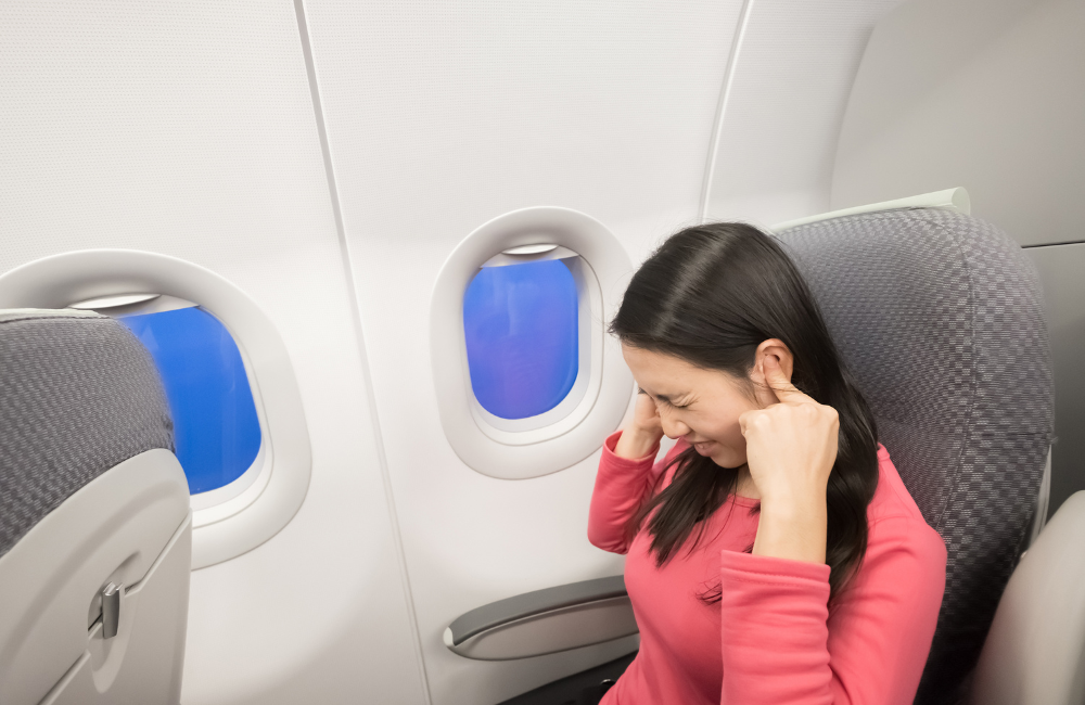 วิธีแก้อาการหูอื้อเมื่อเครื่องบินขึ้นลง